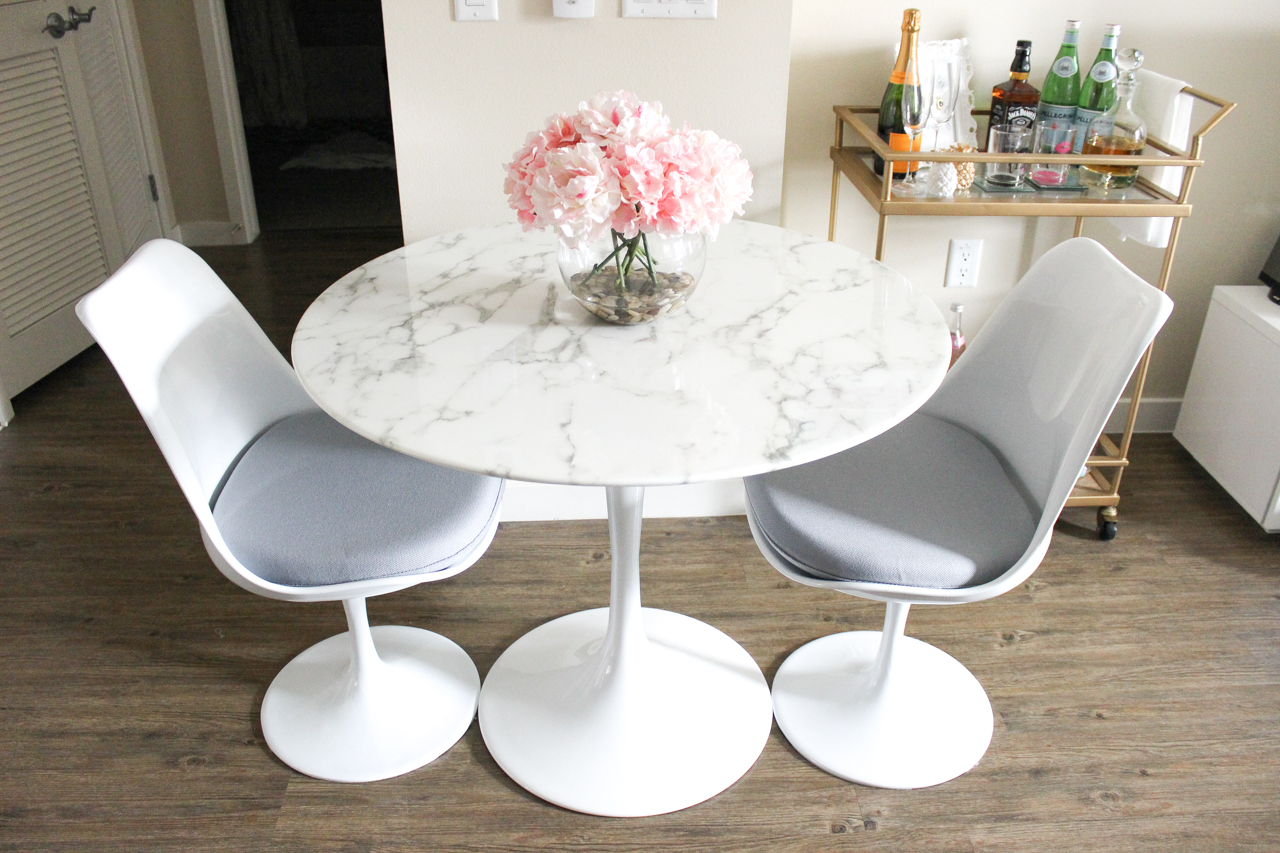 Faux marble table | White Dining Room | Gold Bar Cart | StyledByBlondie.com
