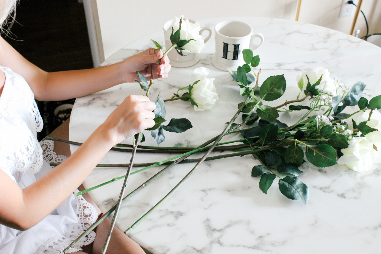 DIY Decor: Coffee cup filled with flowers | StyledByBlondie.com