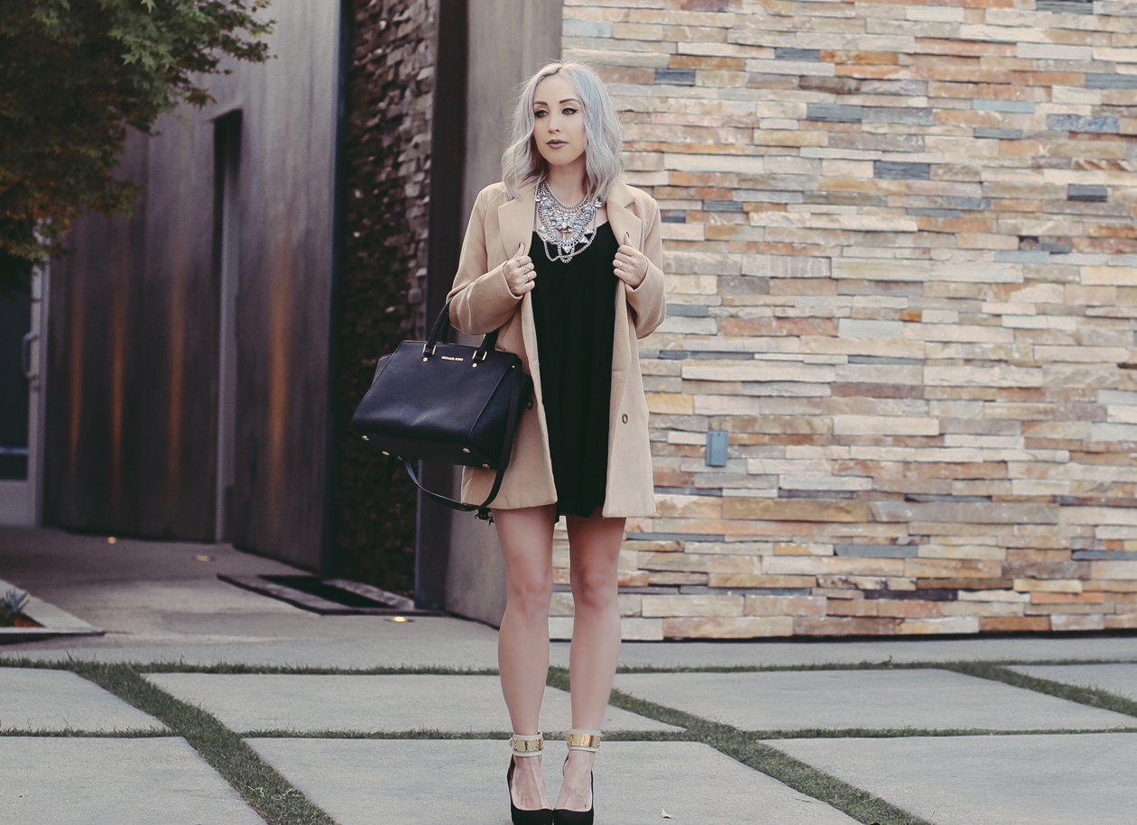 Camel Trench Coat, Black Babydoll Dress, Statement Necklace by @happinessbtq | BlondieintheCity.com