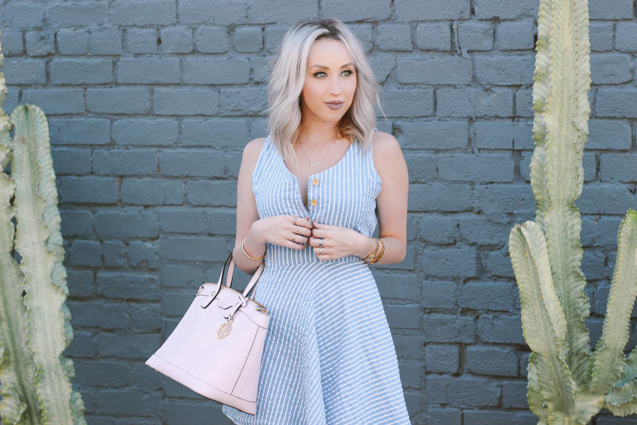 Blondie in the City | Striped blue and white dress, button up | Pink Henri Bendel Bag, Pink Christian Louboutin's