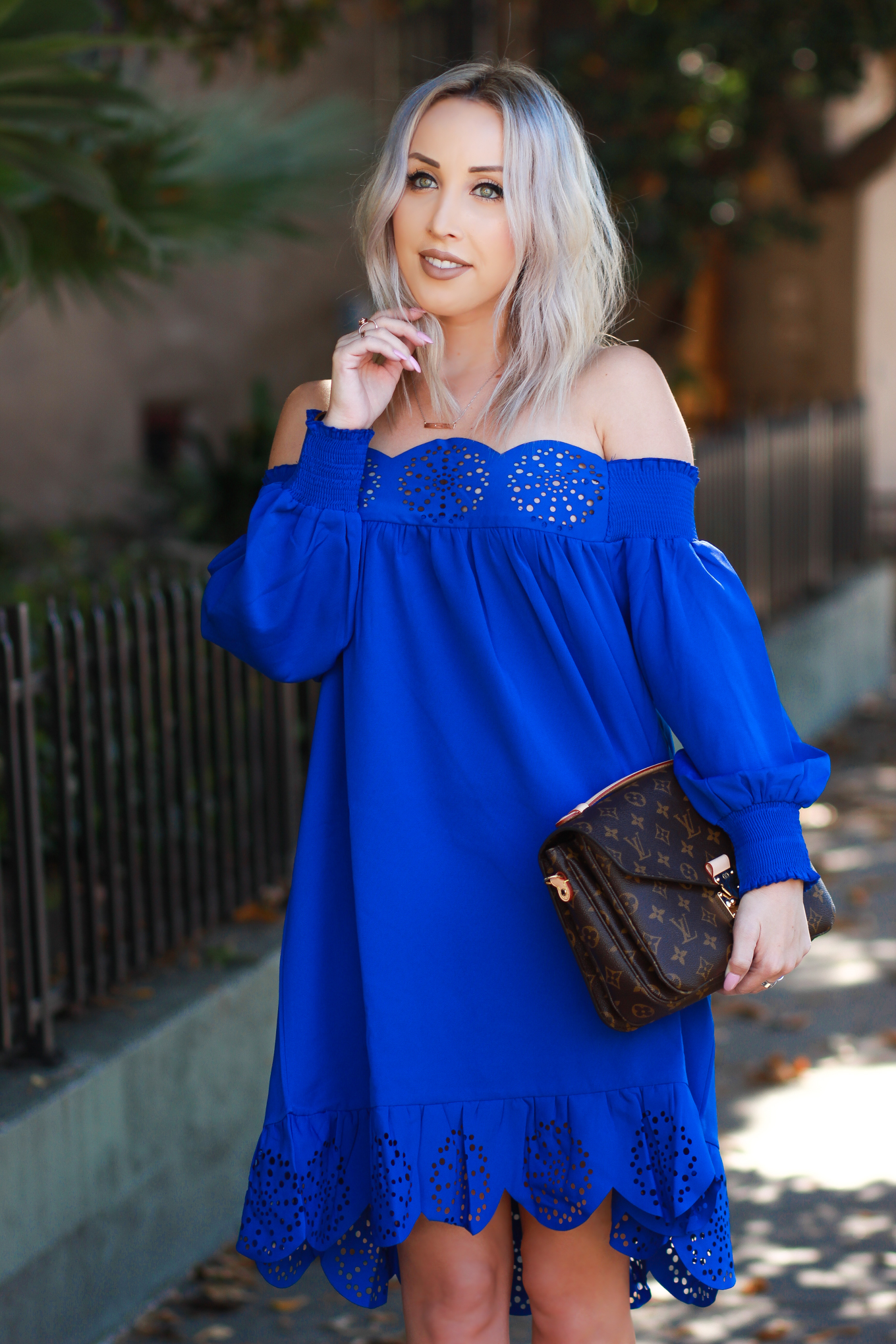Blondie in the City | Bright Blue Scalloped Off The Shoulder Dress | Louis Vuitton Pochette Metis