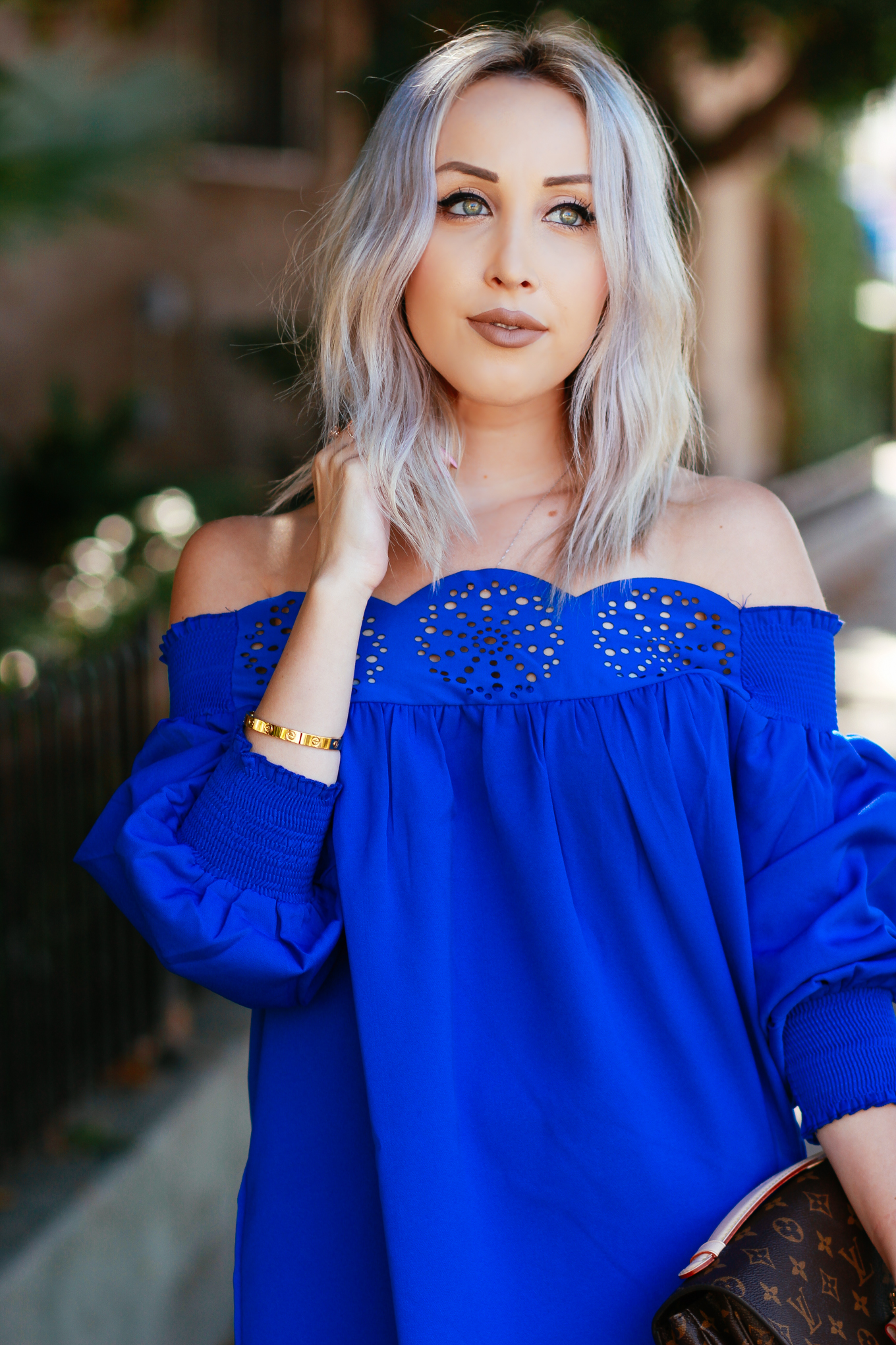 Blondie in the City | Bright Blue Scalloped Off The Shoulder Dress | Louis Vuitton Pochette Metis