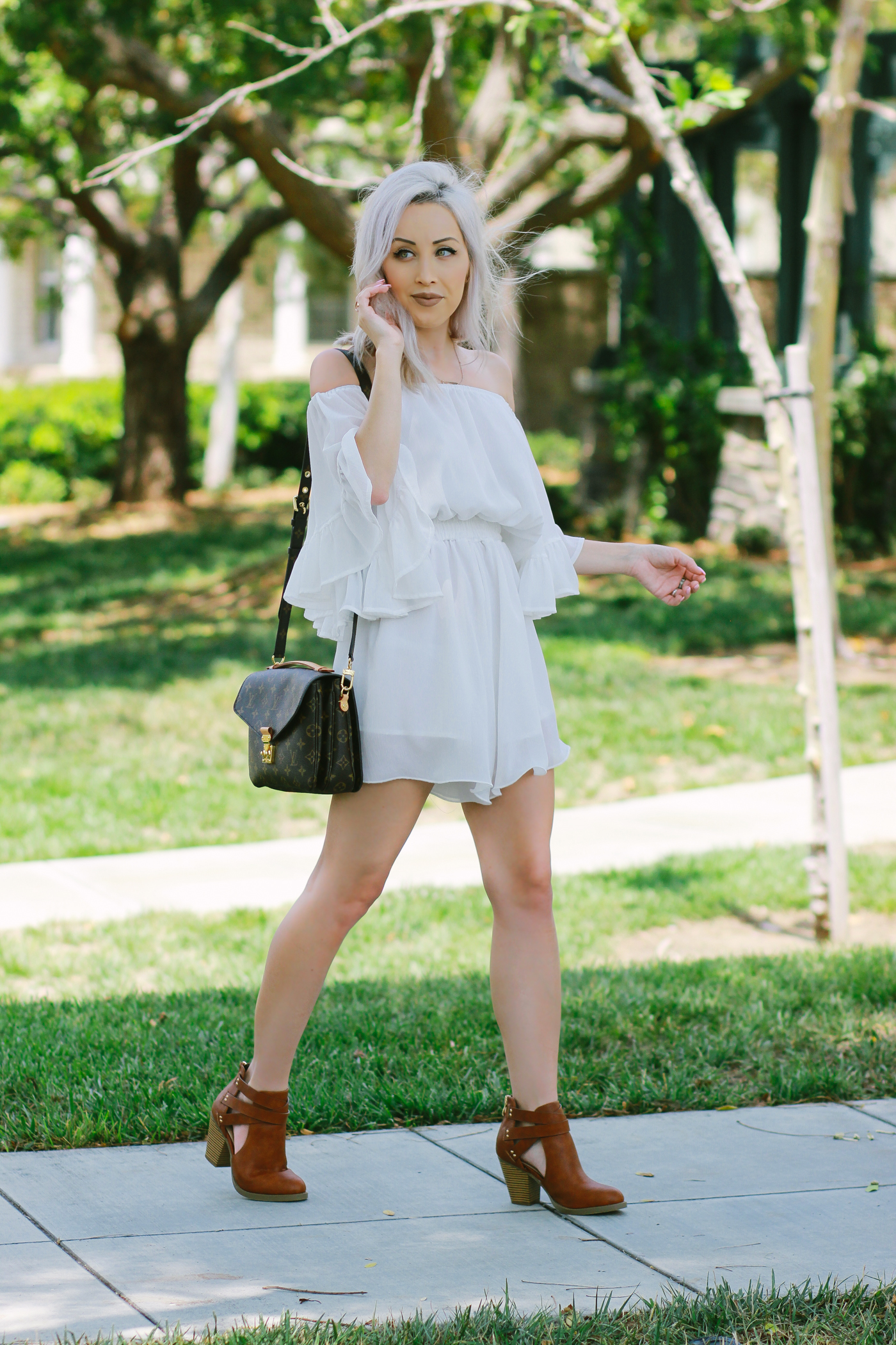 Blondie in the City | White Chiffon romper/playsuit from @chicwish | Brown Booties from @shoedazzle | Summer #OOTD