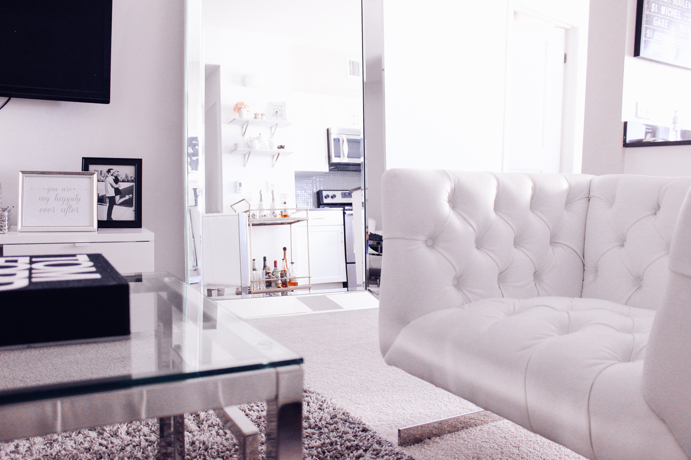 Blondie in the City | 4 Reasons Why Your Home Needs A Leaner Mirror @ZGallerie | Home Decor, black and white home decor, black and white living room, white living room
