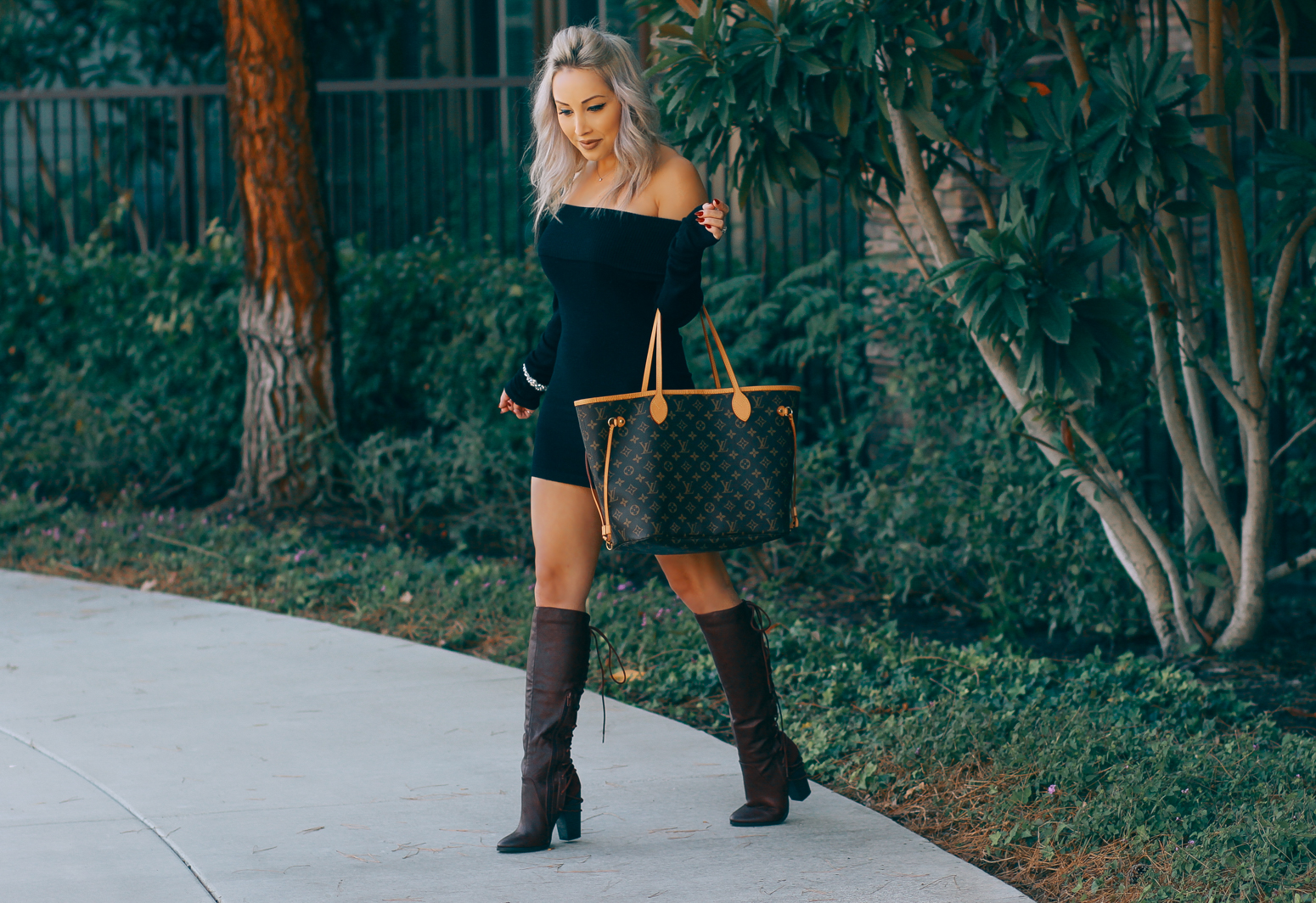Blondie in the City | Black Off The Shoulder Dress, Knee High Boots, Louis Vuitton Neverfull Bag