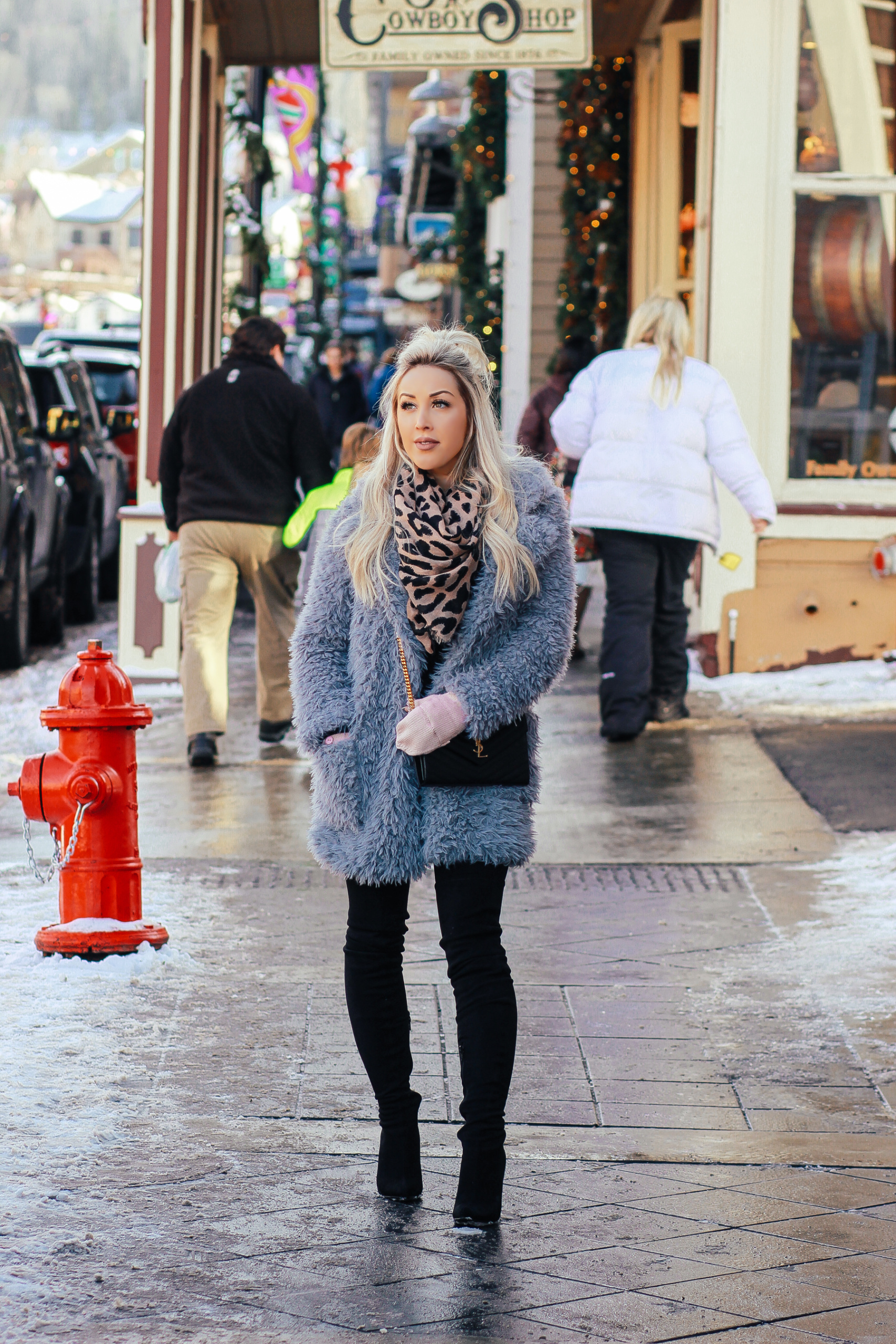 Blondie in the City | Blue Faux Fur Winter Coat, Leopard scarf, YSL Bag, Black Thigh High Boots | Winter Fashion