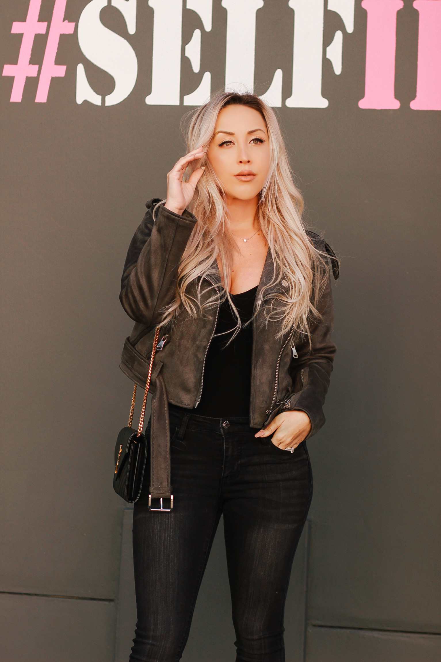 Suede Jacket, Black Bodysuit, Black Denim, YSL Bag | Blondie in the City by Hayley Larue