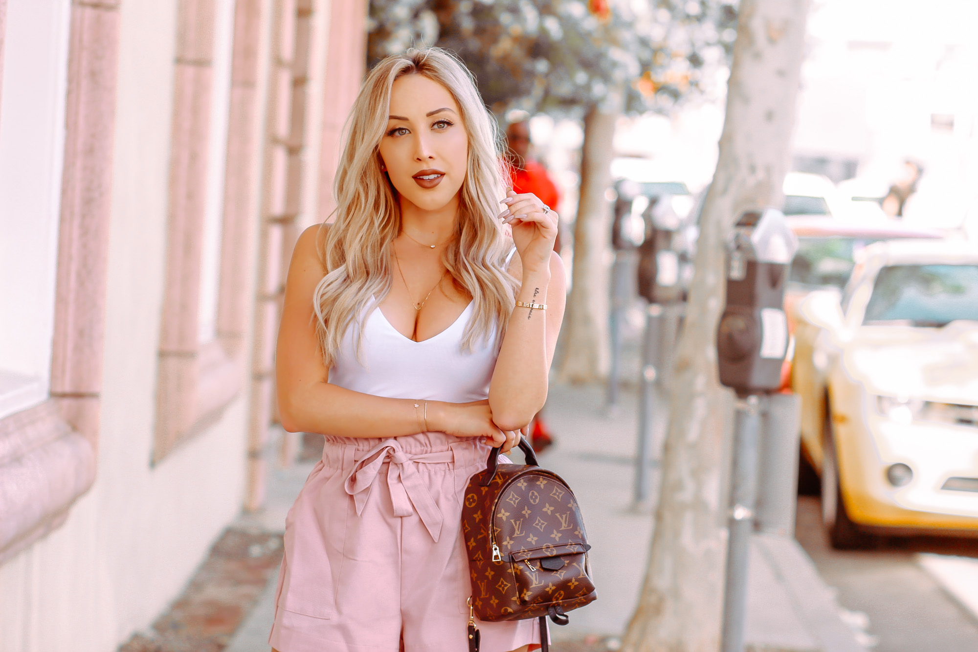 Pink Shorts, White Body Suit, Louis Vuitton Palm Springs Mini | Spring Fashion | Blondie in the City by Hayley Larue