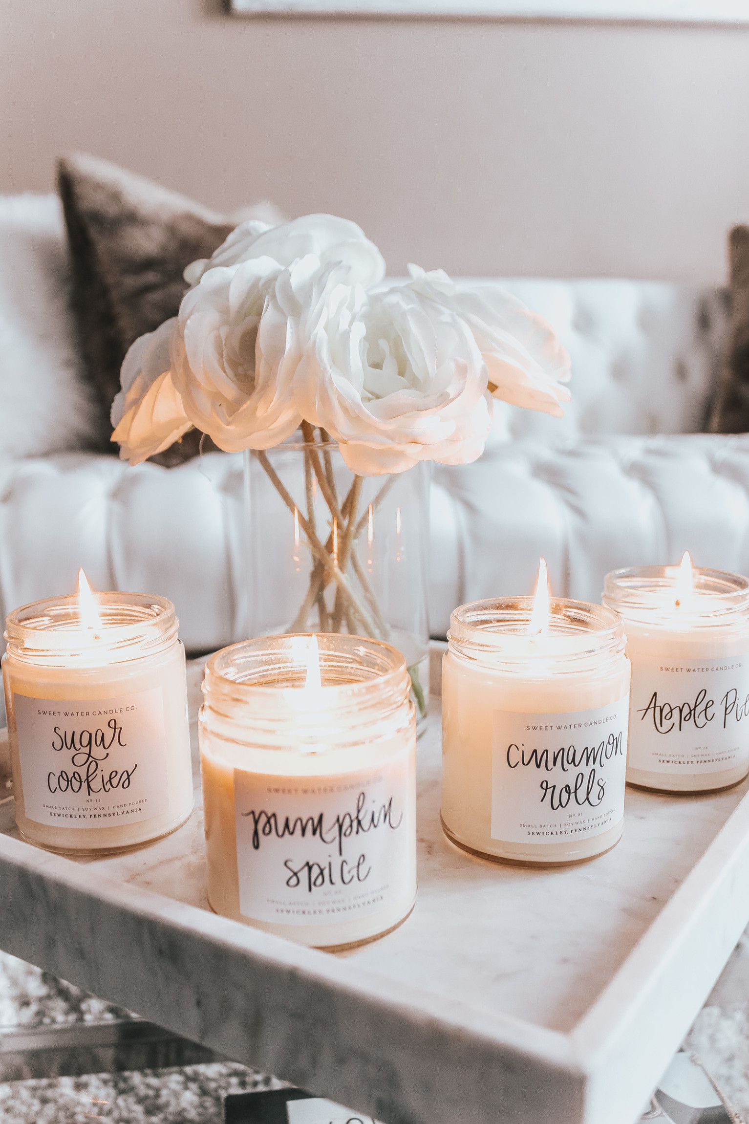 The Best Holiday Candles That Will Have Your Home Smelling Like A Bakery | Holiday Decor | Holiday inspo | Pumpkin Spice | White & Neutral Living Room | Blondie in the City by Hayley Larue 