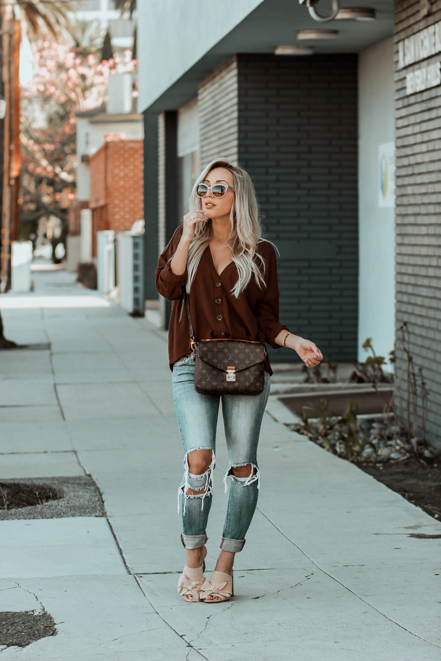 Brown Button Sweater for Fall | Fall Vibes | Distressed Jeans | Louis Vuitton Pochette Metis | Fall Fashion inspo | Blondie in the City by Hayley Larue