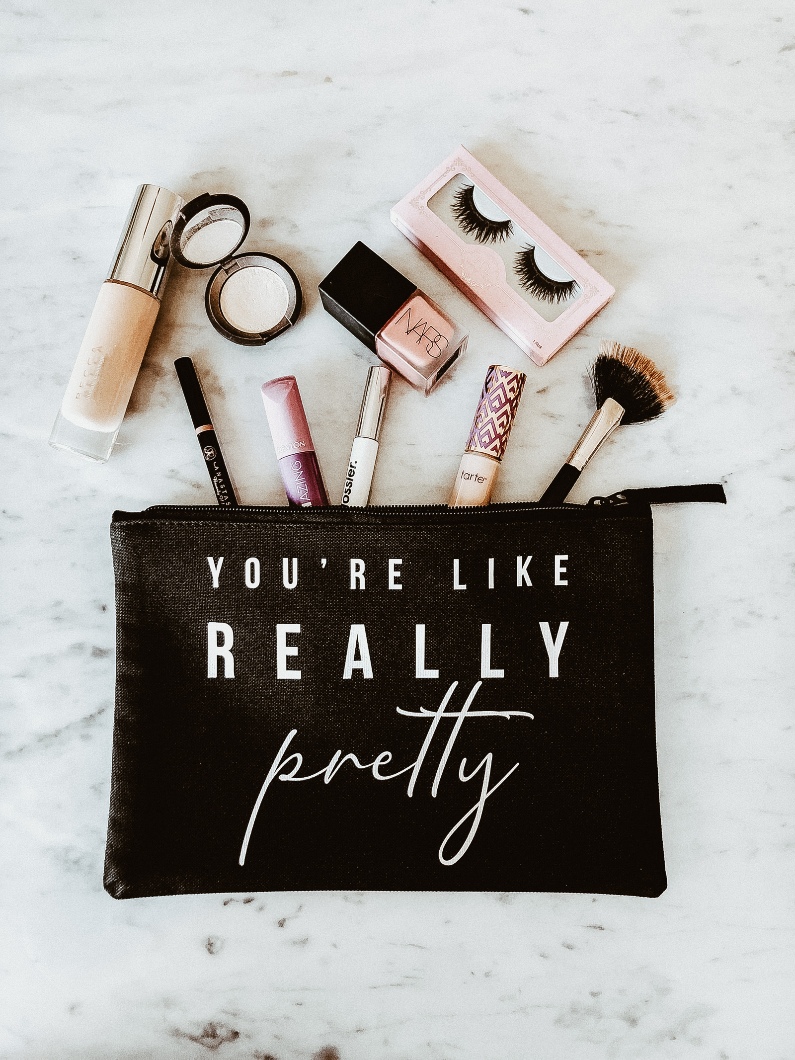 10 Makeup Must Haves | Blondie in the City by Hayley Larue | You're Like Really Pretty makeup bag