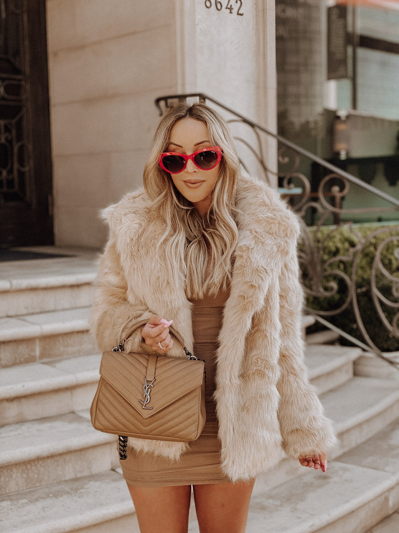 A Red Statement | Faux Fur Coat | Medium YSL College Bag | Nude Louboutins | Blondie in the City by Hayley Larue