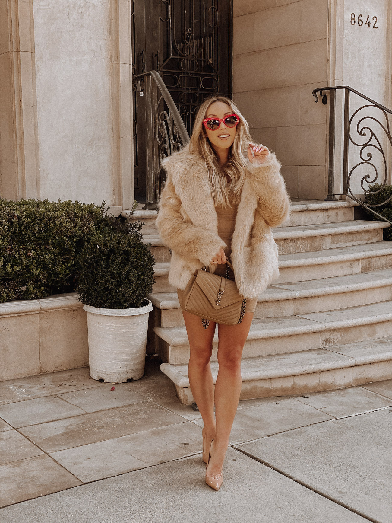 A Red Statement | Faux Fur Coat | Medium YSL College Bag | Nude Louboutins | Blondie in the City by Hayley Larue